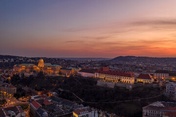 Fototapeta na wymiar Aerial drone shot of Buda castle on Buda Hill during Budapest sunset