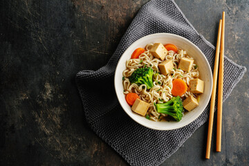 Vegan asian soup with noodles and tofu