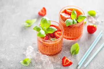 Freshmade drinks with strawberry and basil