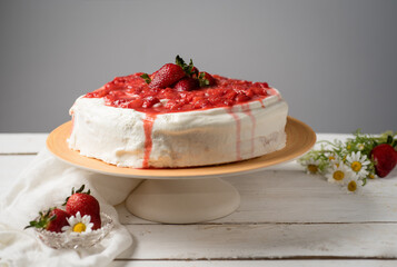 Strawberry whole cake on a plate