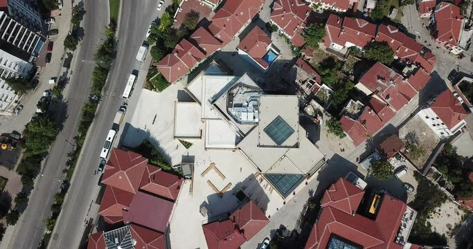 Aerial view of city buildings and vehicles