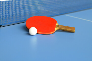 Table Tennis Paddle and ball on the table