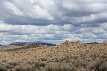 Huge puffy clouds over a desert landscape in Nevada