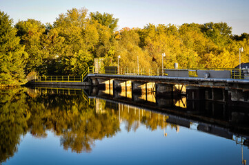 Bridge over the river in autumn