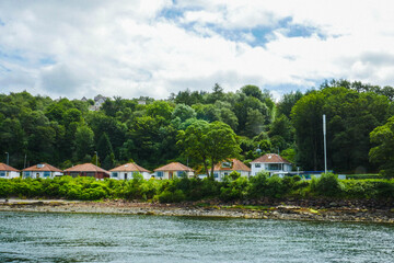 Houses over the lake, village of Luss Scotland.