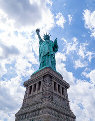 close front view of Statue of Liberty in America on a hot summer day