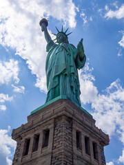 Fototapeta premium close front view of Statue of Liberty in America on a hot summer day