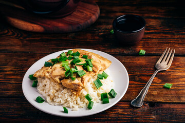 White rice with scrambled eggs with chicken and green onion