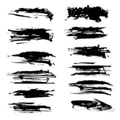 Black textured brush strokes different shapes isolated on a white background