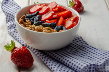 Homemade muesli bowl with strawberry, banana
