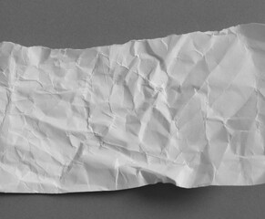 Obraz premium Ripped paper on gray background, space for advertising copy.