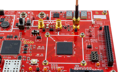 Differential Power Analysis (DPA) target board with FPGA target. Connected to SMA cable. Common...