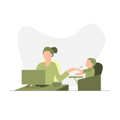 WOman working on laptop and feeding her child 