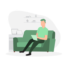 Man sitting on the sofa and working on laptop
