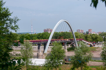 China, Heihe, July 2019: Bridge in the Park on the embankment in Heihe city in summer