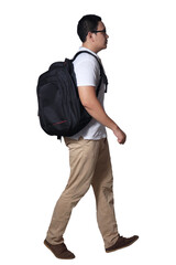 Fototapeta premium Full length portrait of Asian man wearing white shirt, khaki jeans and backpack standing walking, side view