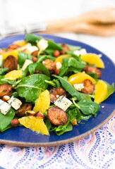 Arugula and roasted potato salad with orange, blue cheese and almonds