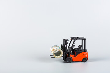 forklift with roll of dollars on gray background. Strongest financial assistance, support of business and people after coronavirus covid-19 pandemic. Mockup with copy space