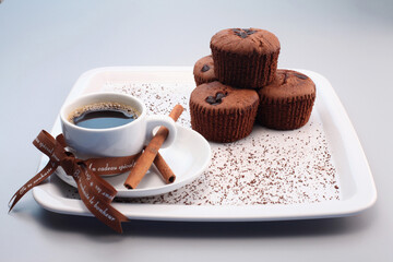 Chocolate chip muffins with a cup of espresso