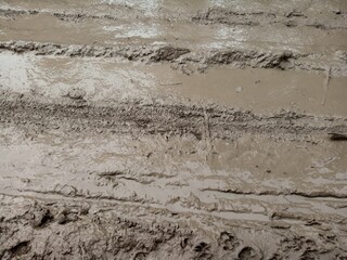 tire track in the sand, muddy land, abstract background