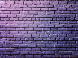Bare and empty exterior brick wall painted in lavander color