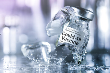 Coronavirus vaccine vial breaking into pieces with splashing liquid. Failure to create a vaccine,...