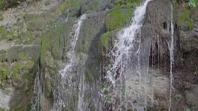 A waterfall caming out of a cave at Afka, Lebanon. Slow motion