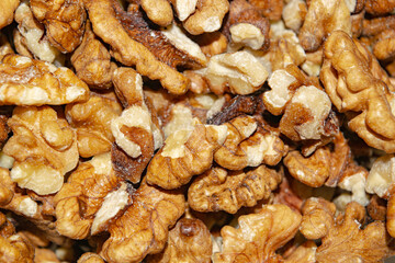 Peeled walnuts close-up. Surface texture. Healthy diet.