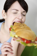 Woman eating burger