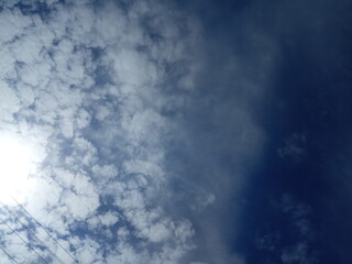 Clouds with dark blue sky background