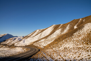 Panorama of Snow Mountain Range Landscape with Blue Sky background from New Zealand.