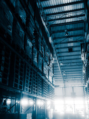 Fototapeta na wymiar Warehouse cargo building store, warehouse interior with shelves, pallets and boxes for stock and sorting shipment goods in freight, logistics and transportation industrial
