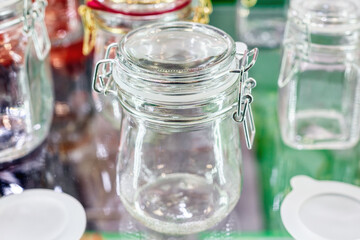 Glass jars with glass lockable lids.