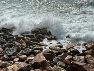 waves crashing on rocks