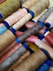 Multi-colored threads lie in a box