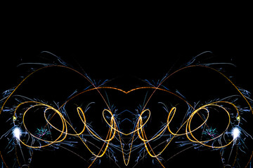 Abstract Long Exposure Light Trail Flourish on Black Background