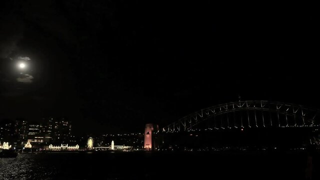 Sydney Harbour Bridge and Opera House with the super moon time lapse shot in 4k high resolution