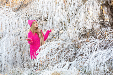 beautiful asian woman is relaxing in nature in winter in a beautiful location in New Zealand.