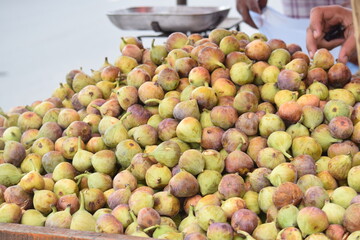 fig fruits, a sweet, soft, purple or green fruits at road side