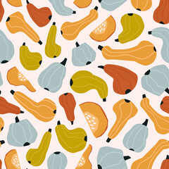 Stylized colored pumpkins isolated on light pink backdrop. Autumn harvest. Background with vegetables. Hand drawn vector seamless pattern. Cartoon style for textile, fabric, wrapping paper, wallpaper.