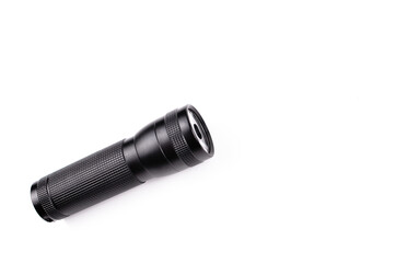 Black flashlight isolated on a white background