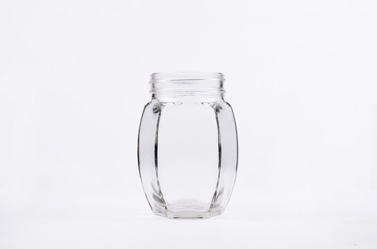 empty glass jar isolated in white background