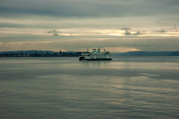 Ferry in Puget Sound near Bainbridge Island during cloudy sunset