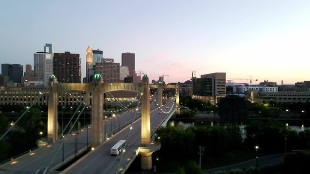 aerial view of minneapolis downtown from hennepin bridge minutes after sunset