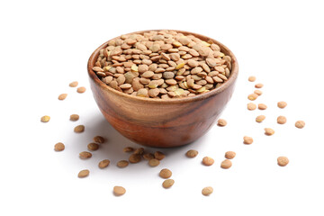 Raw lentils in bowl on white background