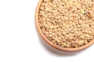 Raw lentils in bowl on white background