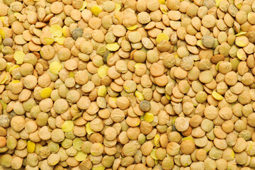 Raw lentils as background, top view
