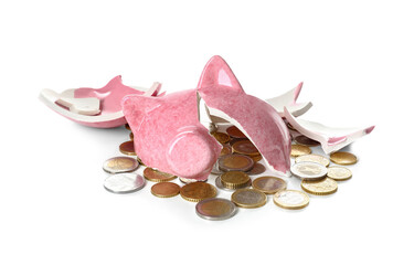 Broken piggy bank and coins on white background