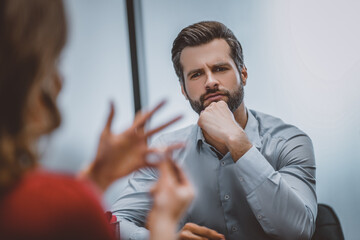 Man looking at his ex with regret