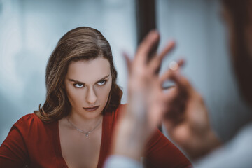 Fototapeta premium Woman looking how her husband taking off the wedding ring